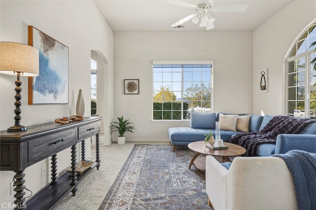 1608 Via Flora Paso Robles, CA 93446 - Photo 10 of 57 a spacious bedroom with furniture and a large window
