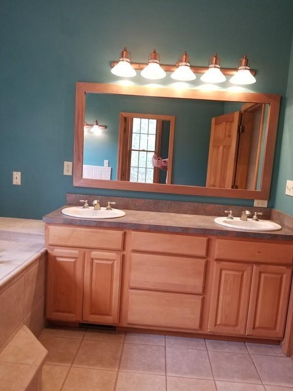 75 Cummings Road Ware, MA 01082 - Photo 34 of 37 a bathroom with a sink and a mirror