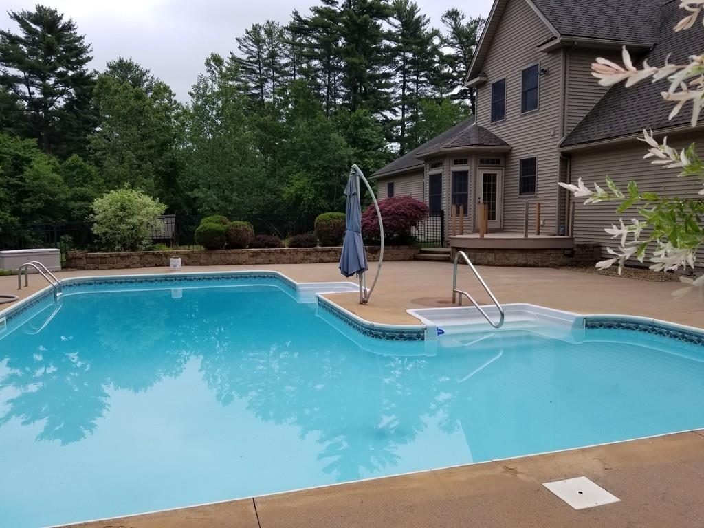 75 Cummings Road Ware, MA 01082 - Photo 10 of 37 a view of a house with swimming pool