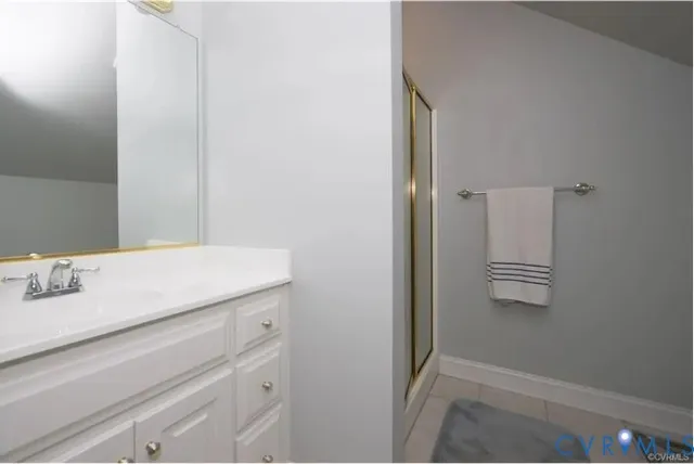 a bathroom with a bathtub and sink