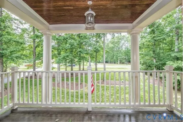 a view of a porch and a yard