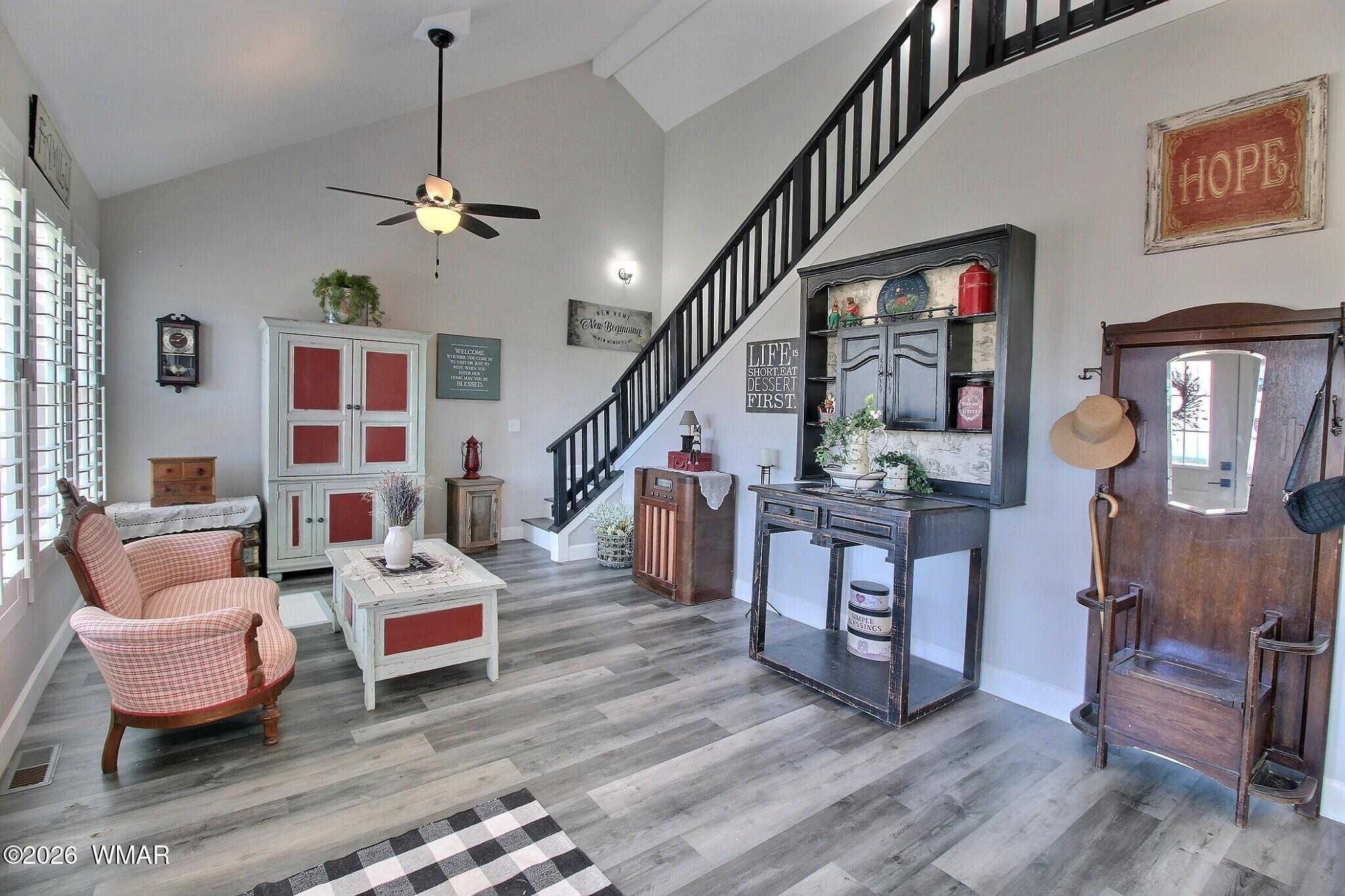 5325 Pinedale Wash Road Pinedale, AZ 85934 - Photo 21 of 32 a living room with furniture and wooden floor