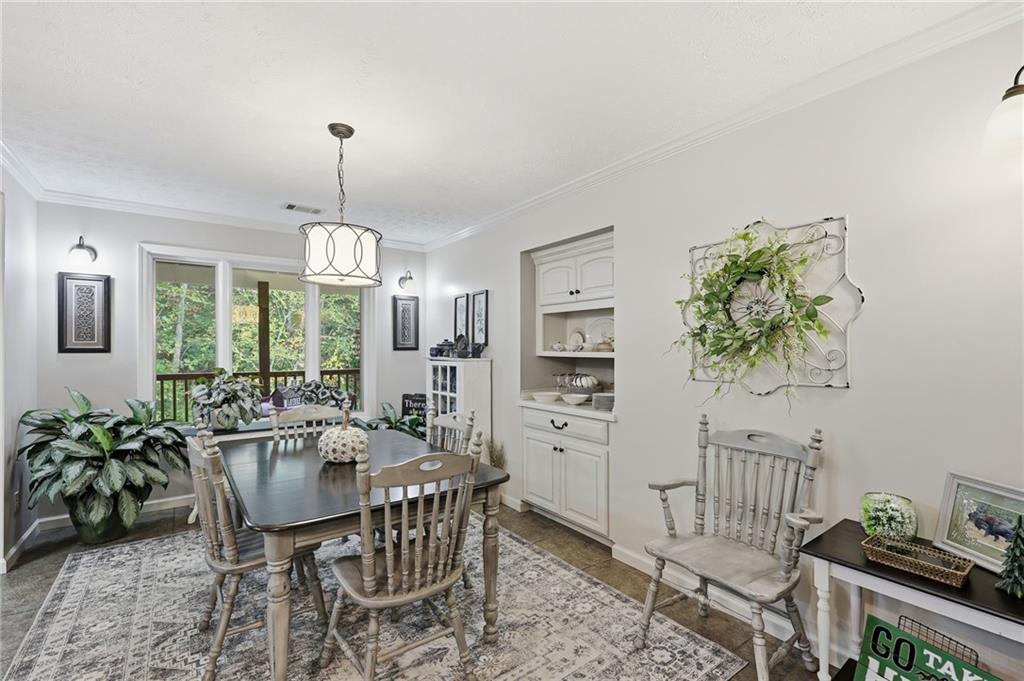 136 Ross Road Mineral Bluff, GA 30559 - Photo 17 of 65 a view of a dining room with furniture window and outside view
