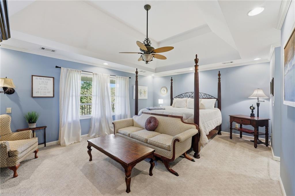 136 Ross Road Mineral Bluff, GA 30559 - Photo 21 of 68 a bedroom with furniture and a chandelier