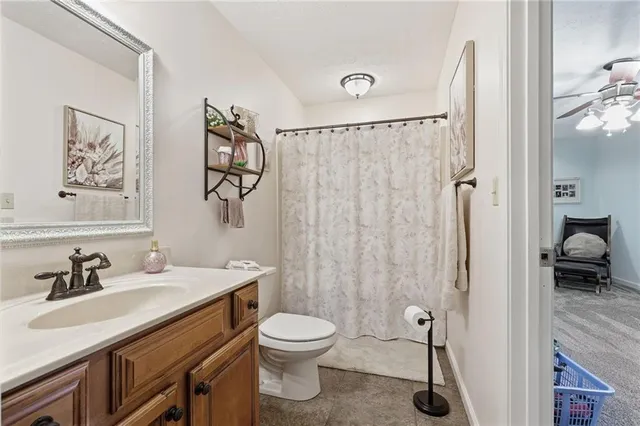 a view of a wooden deck with chairs and a yard