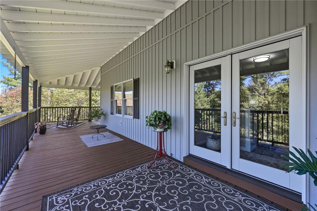 136 Ross Road Mineral Bluff, GA 30559 - Photo 27 of 68 a view of a house with a patio