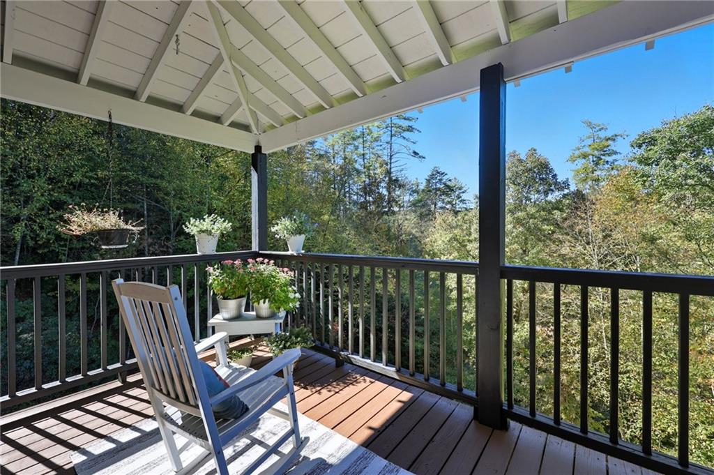 136 Ross Road Mineral Bluff, GA 30559 - Photo 30 of 68 a view of a two chairs in the balcony