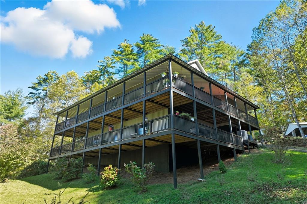 136 Ross Road Mineral Bluff, GA 30559 - Photo 3 of 65 a front view of a house with a yard