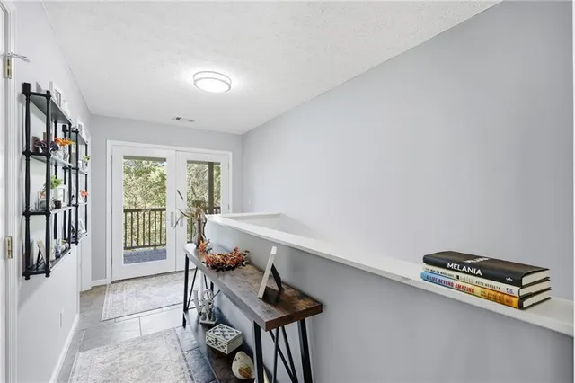 a bathroom with a sink a toilet a mirror a vanity and shower