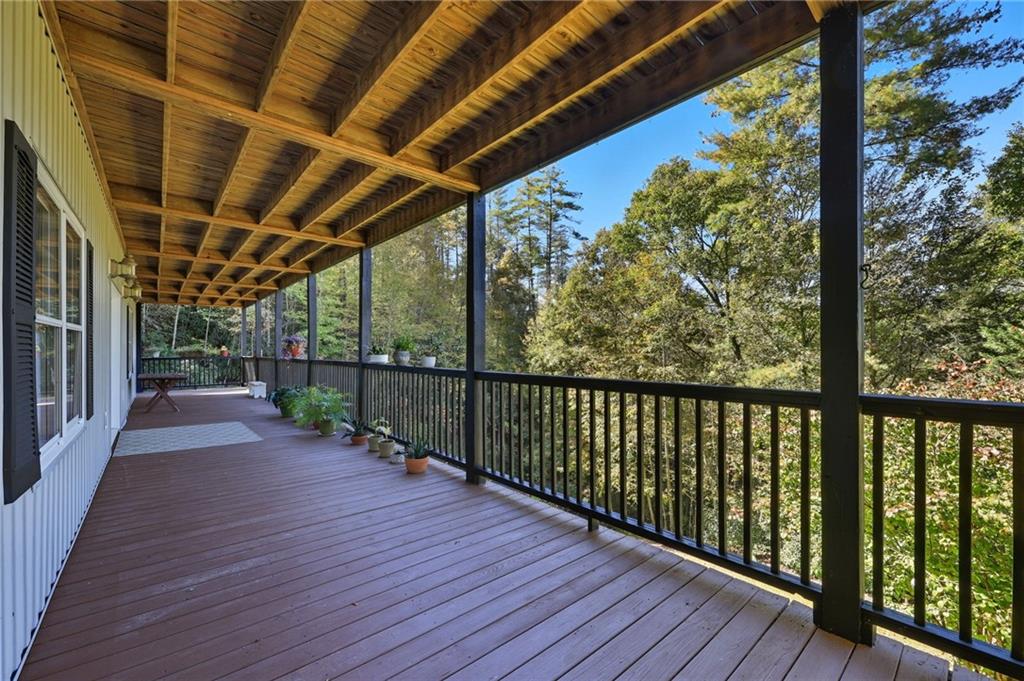 136 Ross Road Mineral Bluff, GA 30559 - Photo 50 of 68 a view of a porch with wooden floor