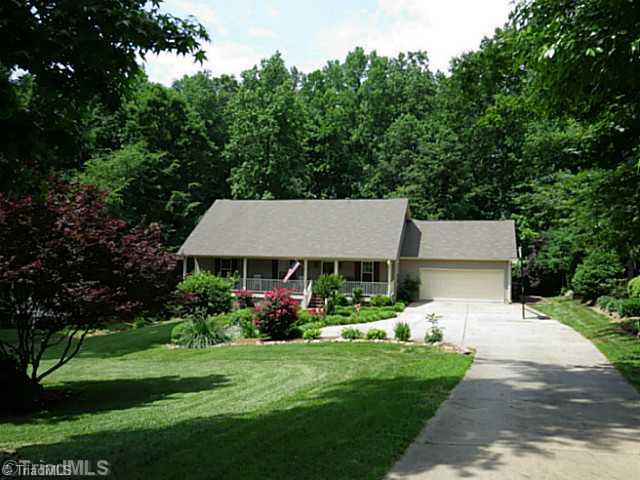 7507 Keating Drive Oak Ridge, NC 27310 - Photo 1 of 16 Exterior Front.