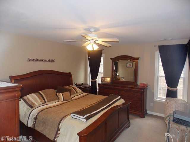 7507 Keating Drive Oak Ridge, NC 27310 - Photo 14 of 16 Master Bedroom.
