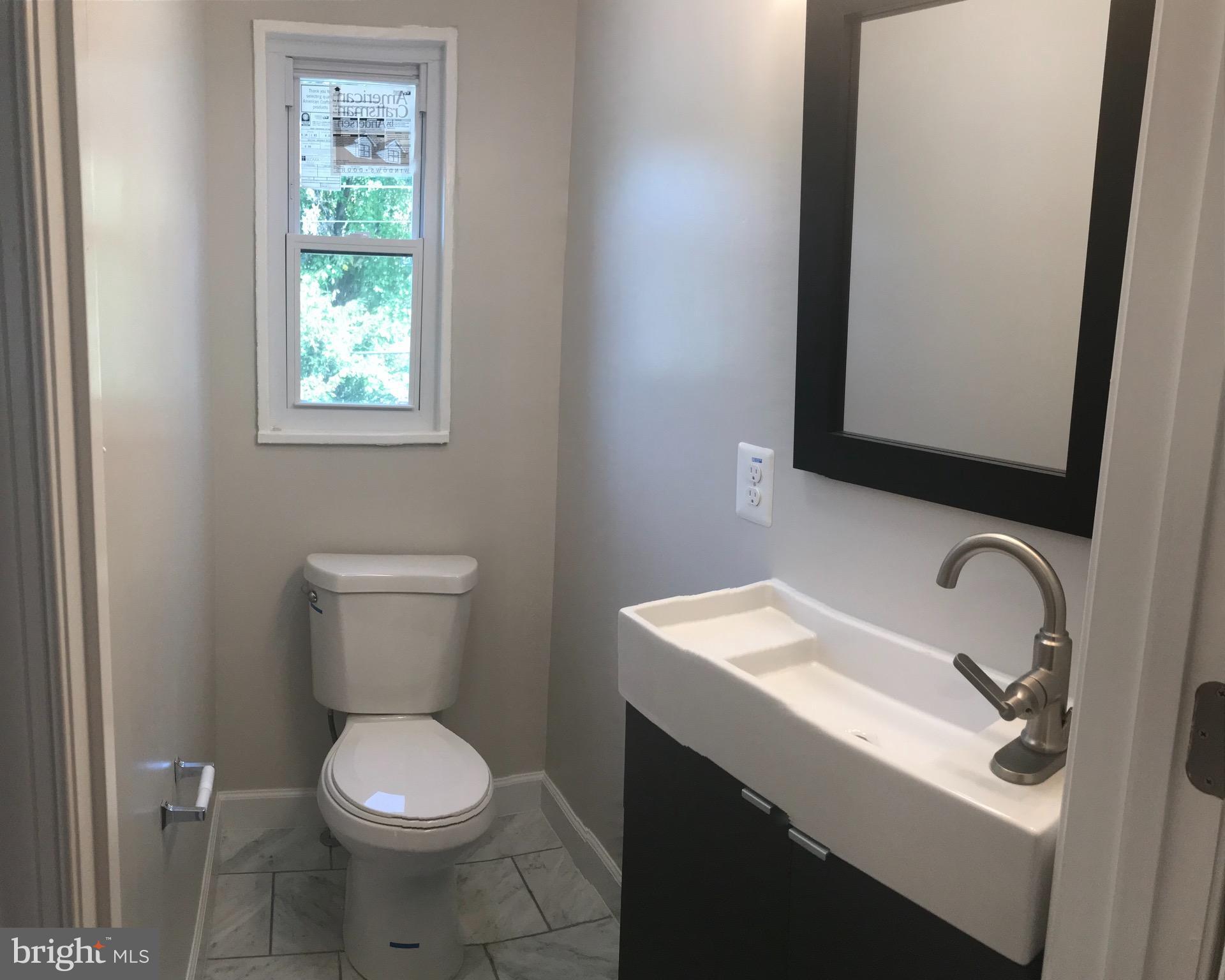 720 Ridge Road Southeast Washington, DC 20019 - Photo 21 of 27 Main level Powder Bath