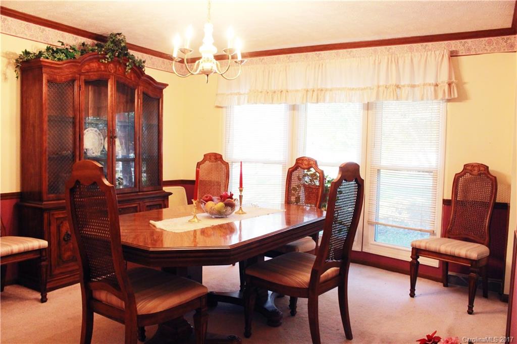 1262 Stateline Road Lake Wylie, SC 29710 - Photo 12 of 20 a dining room with furniture and window