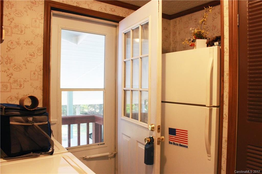 1262 Stateline Road Lake Wylie, SC 29710 - Photo 13 of 20 a bathroom with a bathtub and a window