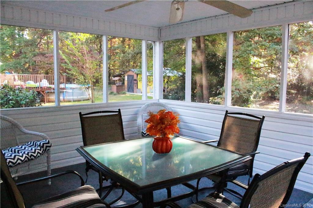 1262 Stateline Road Lake Wylie, SC 29710 - Photo 3 of 20 a view of a dining room with furniture window and outside view