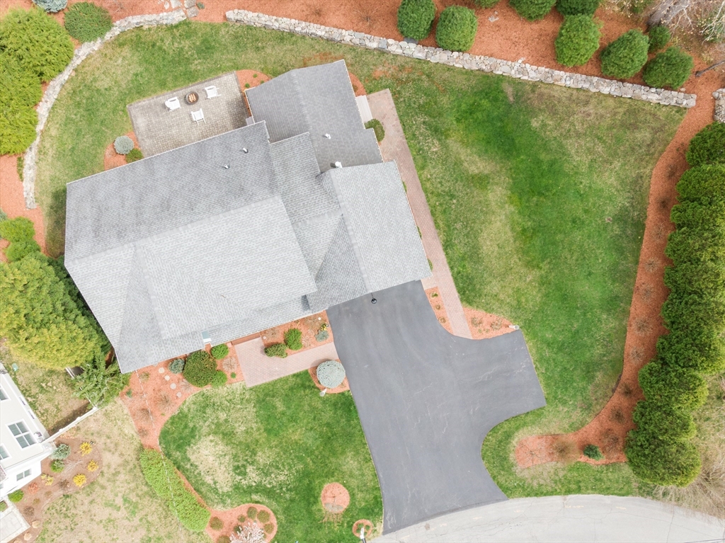 27 Maxwell Road Bedford, MA 01730 - Photo 27 of 41 an aerial view of a house with a yard