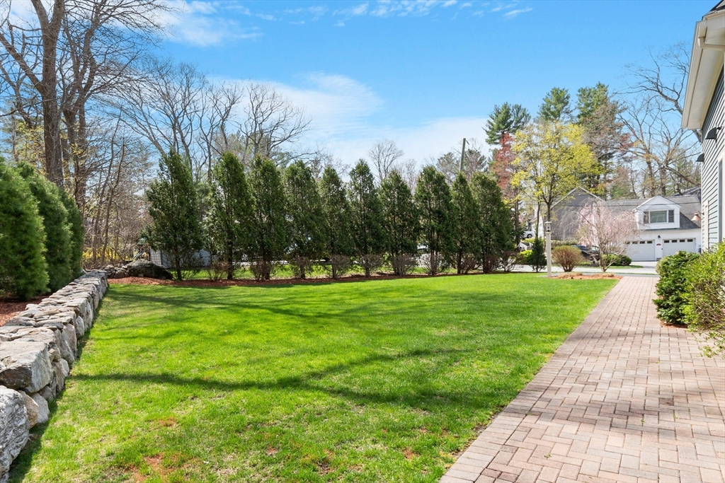27 Maxwell Road Bedford, MA 01730 - Photo 30 of 41 a view of a park with large trees