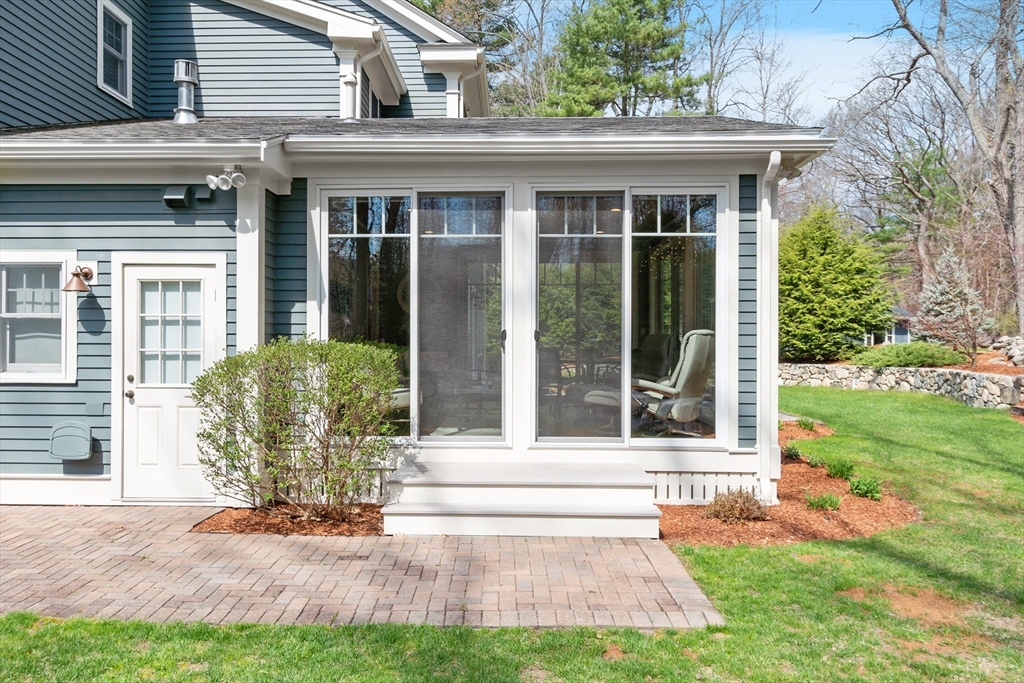 27 Maxwell Road Bedford, MA 01730 - Photo 31 of 41 a view of a house with yard and plants