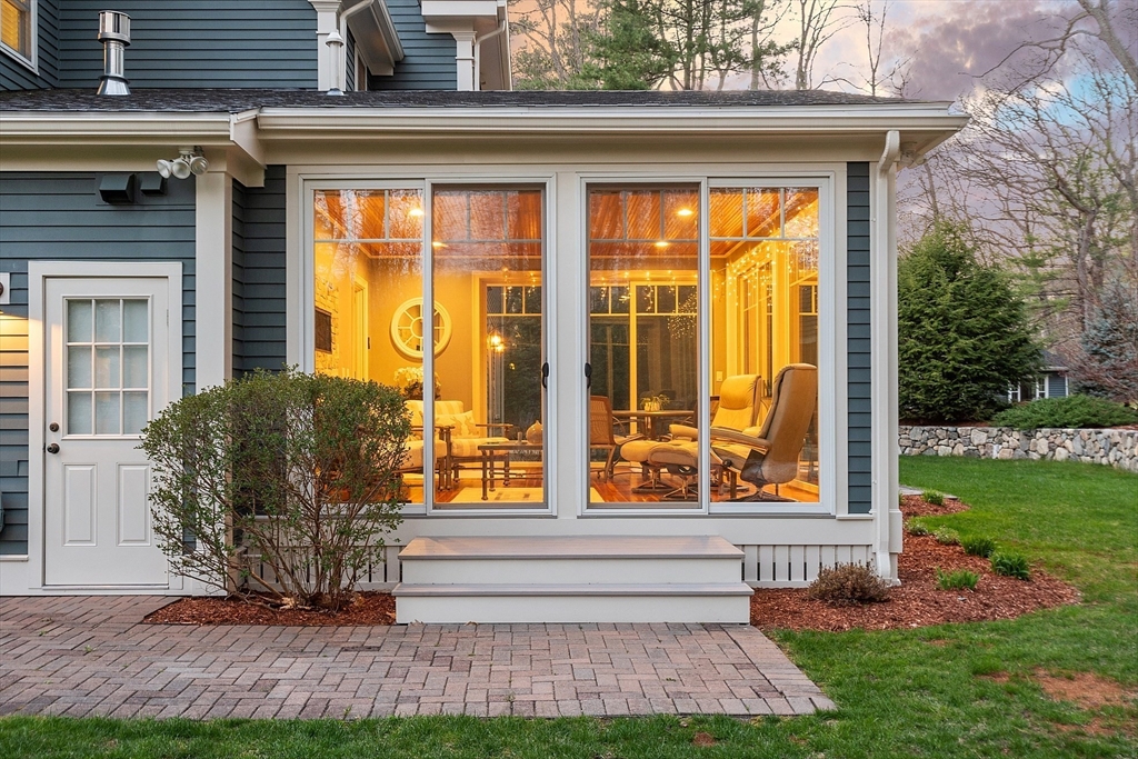 27 Maxwell Road Bedford, MA 01730 - Photo 32 of 41 a front view of a house with garden