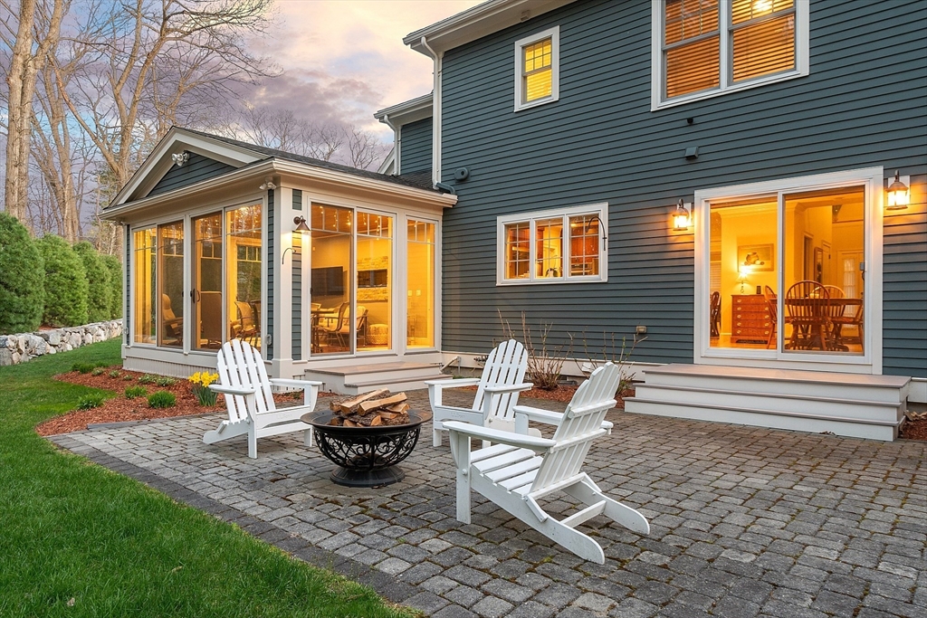 27 Maxwell Road Bedford, MA 01730 - Photo 33 of 41 a view of a house with backyard and sitting area