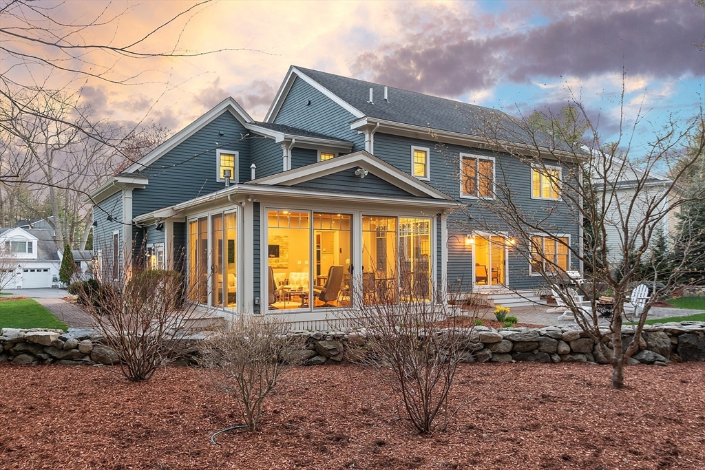 27 Maxwell Road Bedford, MA 01730 - Photo 34 of 41 a front view of a house with garden