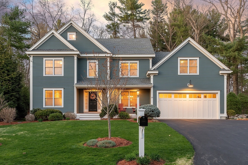 27 Maxwell Road Bedford, MA 01730 - Photo 38 of 41 a front view of a house with a yard