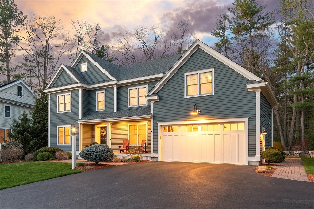 27 Maxwell Road Bedford, MA 01730 - Photo 39 of 41 a front view of a house with garden