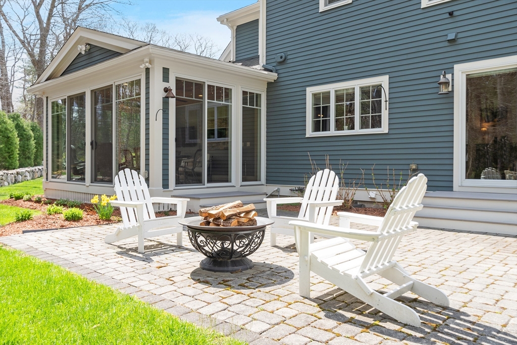 27 Maxwell Road Bedford, MA 01730 - Photo 40 of 41 a view of a house with backyard and sitting area
