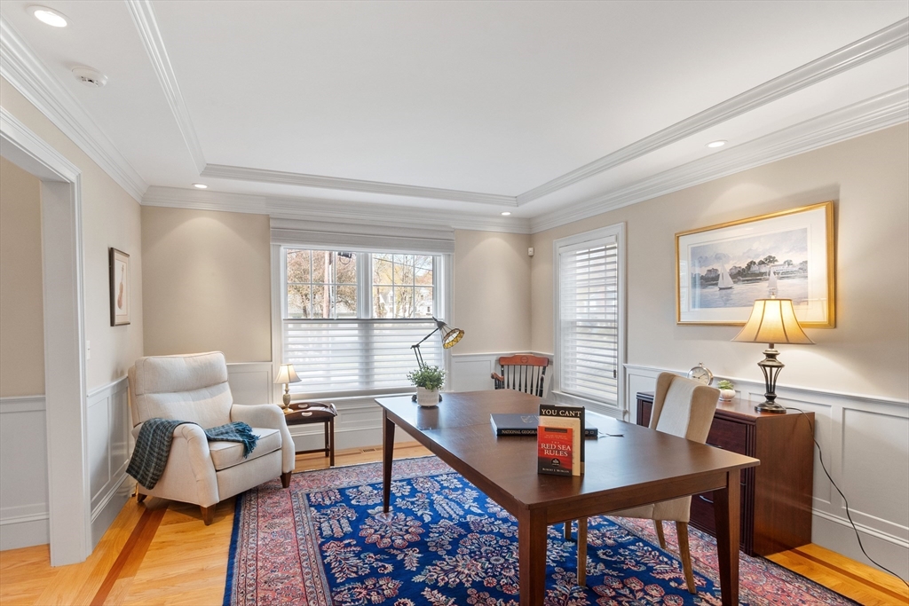 27 Maxwell Road Bedford, MA 01730 - Photo 10 of 41 a living room with furniture a table and a window