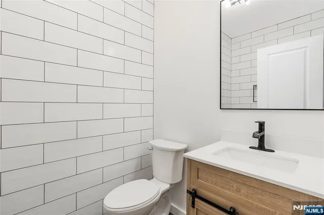 a bathroom with a toilet and sink