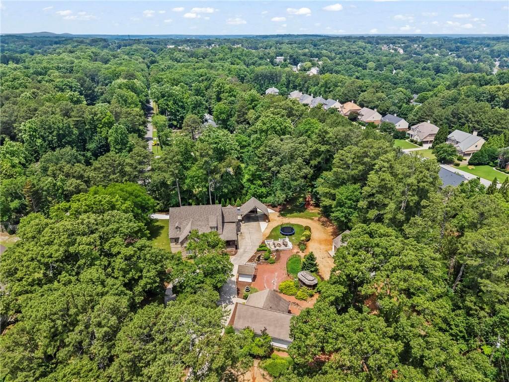 2630 Old Atlanta Road Cumming, GA 30041 - Photo 7 of 87 an aerial view of a house with a yard