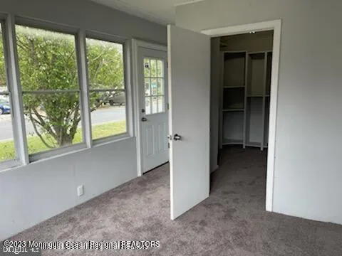 a view of an empty walk in closet