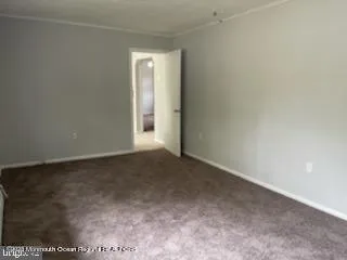 a backyard of a house with plants and garden