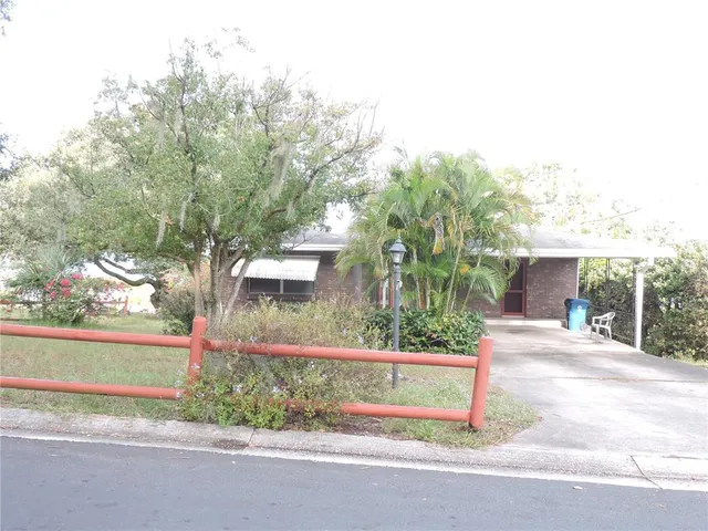 front view of a house with a street