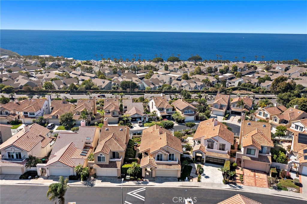 27 Regatta Way Dana Point, CA 92629 - Photo 2 of 24 an aerial view of residential houses with outdoor space and parking