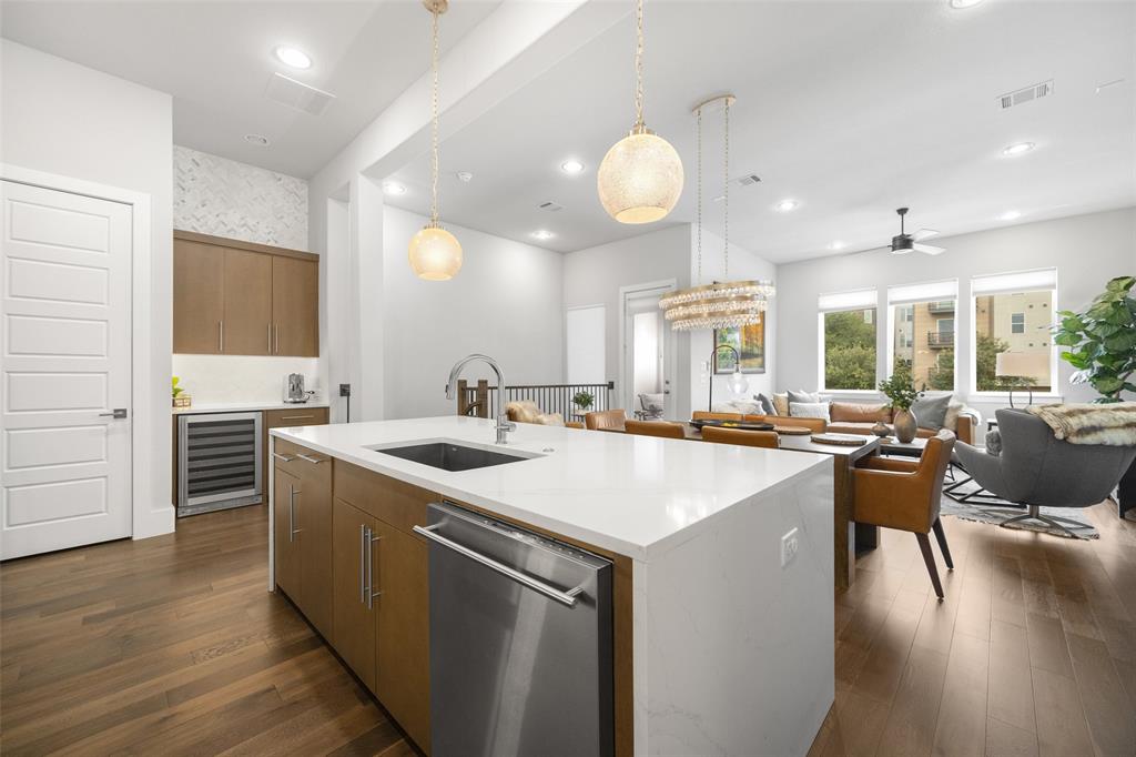 7632 Highcroft Way Plano, TX 75024 - Photo 10 of 28 a large kitchen with lots of counter space a sink and appliances