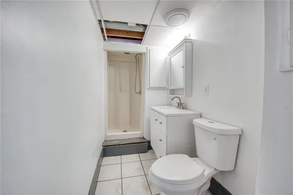 a bathroom with a sink and toilet