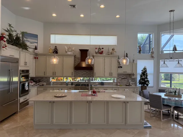 a kitchen with a table chairs and microwave