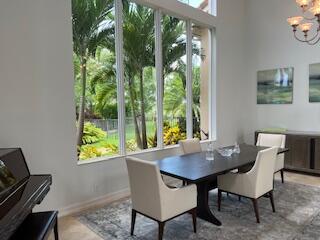 182 Rosalia Court Jupiter, FL 33478 - Photo 9 of 29 a view of a dining room with furniture window and outside view