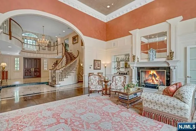 a large kitchen with a table and chairs