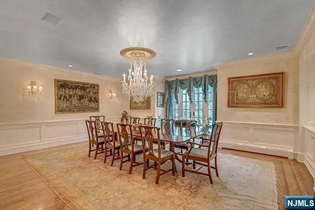 a view of a living room and dining room