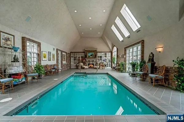 a view of a balcony with furniture