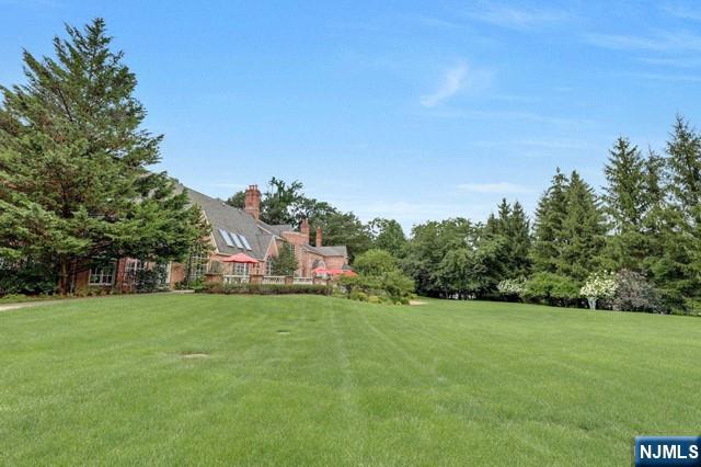 1055 High Mountain Road Franklin Lakes, NJ 07417 - Photo 33 of 42 a view of a field of grass and trees