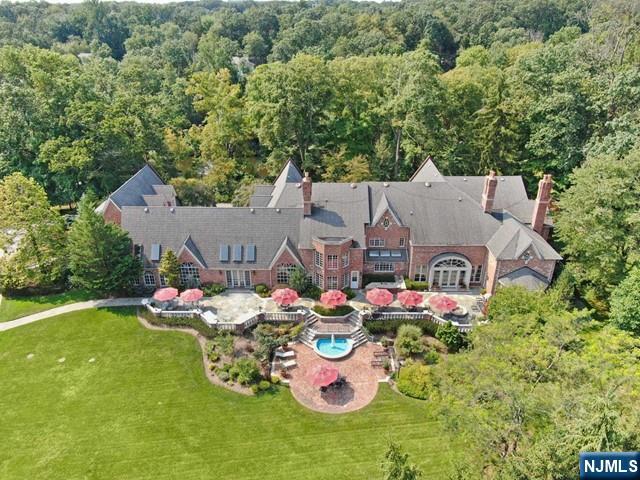 1055 High Mountain Road Franklin Lakes, NJ 07417 - Photo 34 of 42 an aerial view of a house with garden