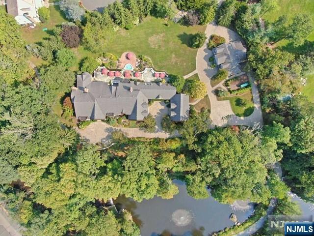 1055 High Mountain Road Franklin Lakes, NJ 07417 - Photo 35 of 42 view of outdoor space with lots of trees