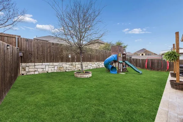 a garden view with a seating space