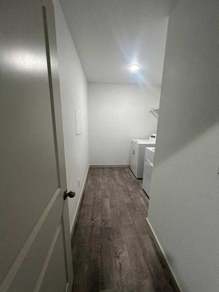 10518 Aberdeen Avenue Lubbock, TX 79424 - Photo 11 of 20 a view of a room with wooden floor