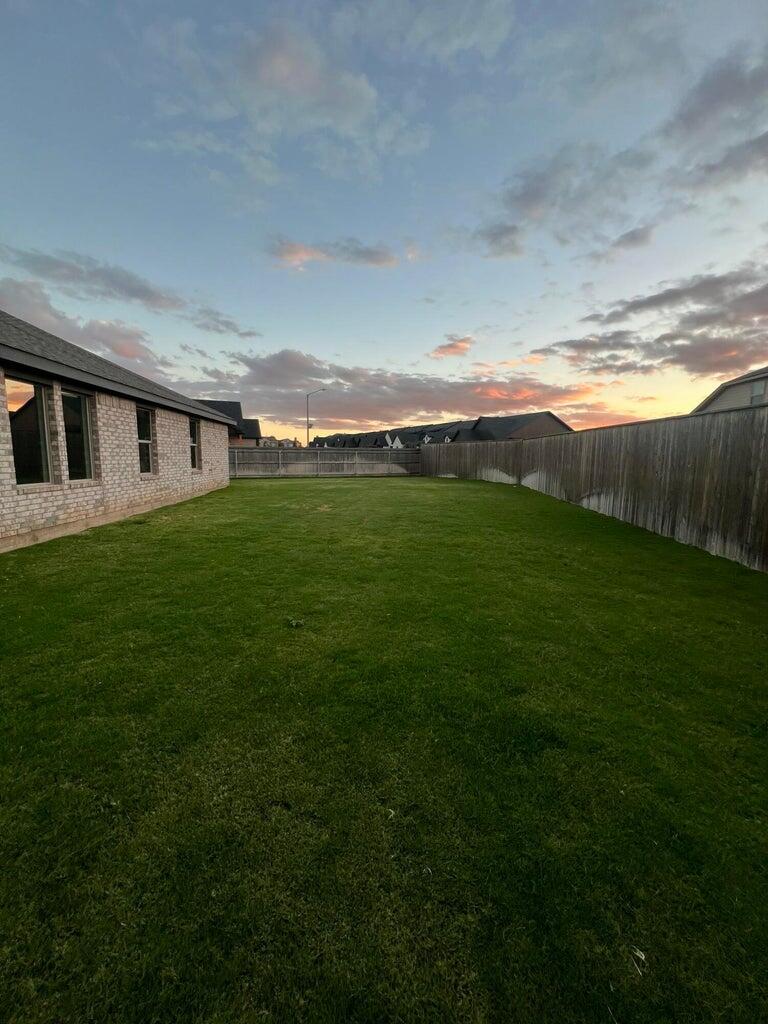 10518 Aberdeen Avenue Lubbock, TX 79424 - Photo 20 of 20 a view of an ocean & house with a big yard