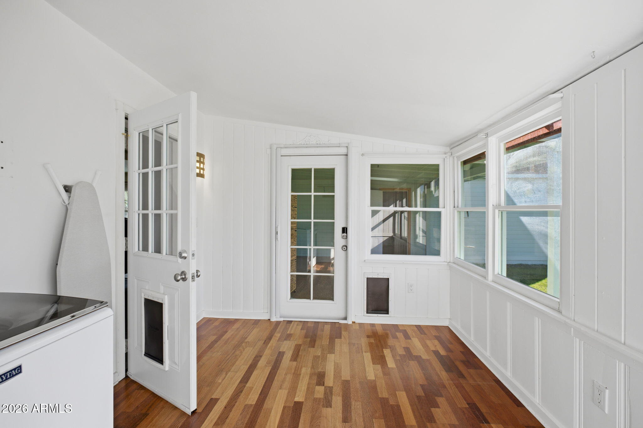 427 East Oregon Avenue Phoenix, AZ 85012 - Photo 17 of 32 a view of a bedroom with windows